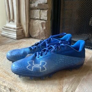 Under armor, size 9 blue football cleats. Been worn less than 10 times .No holes